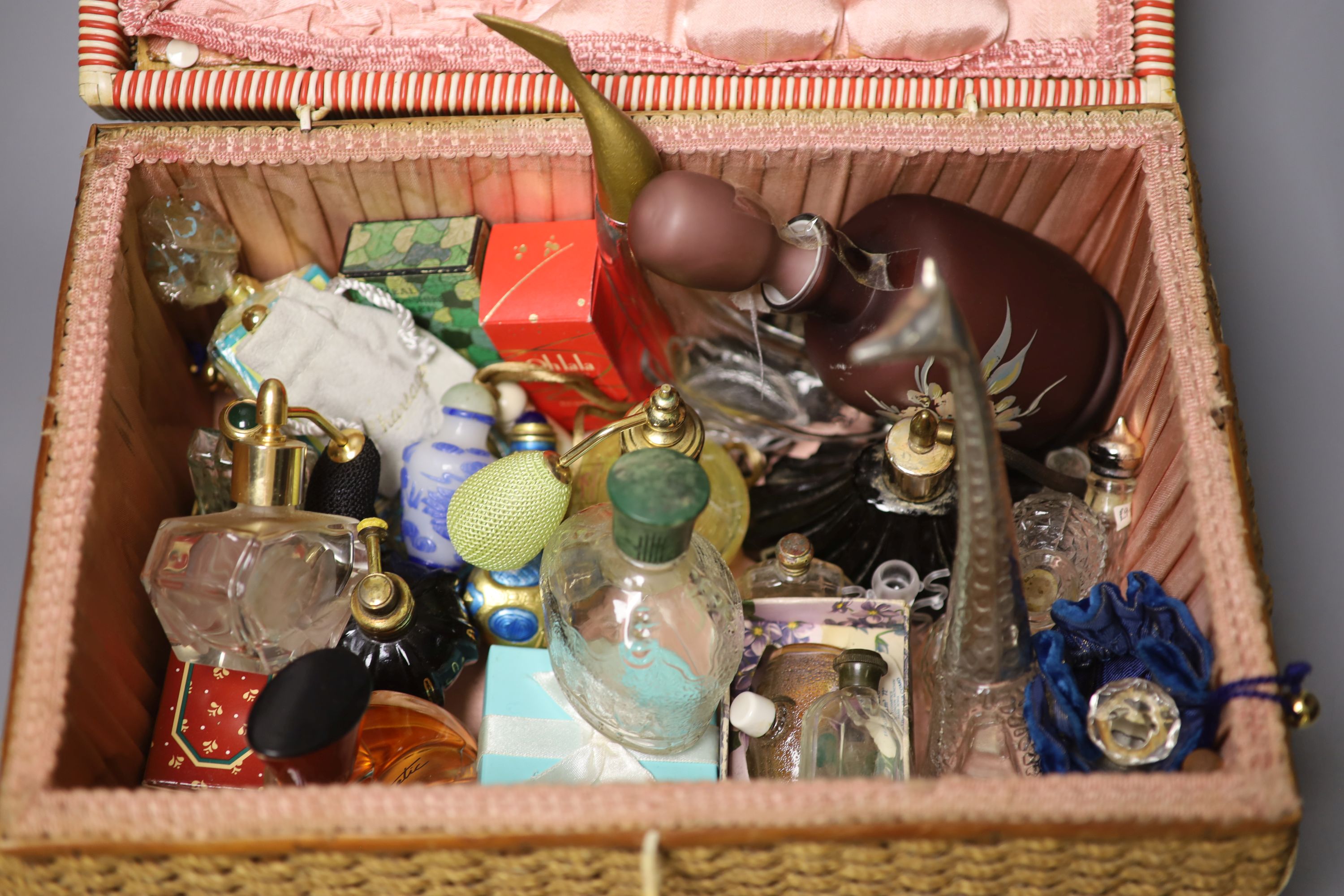 A quantity of mixed scent bottles